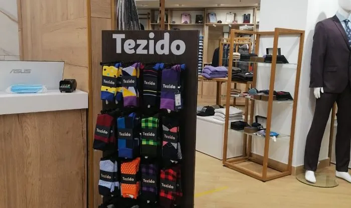 Установи стойку с носками Tezido в свой магазин и получи дополнительный доход от 250 000 рублей!